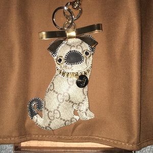 Oliver out Gucci keychain